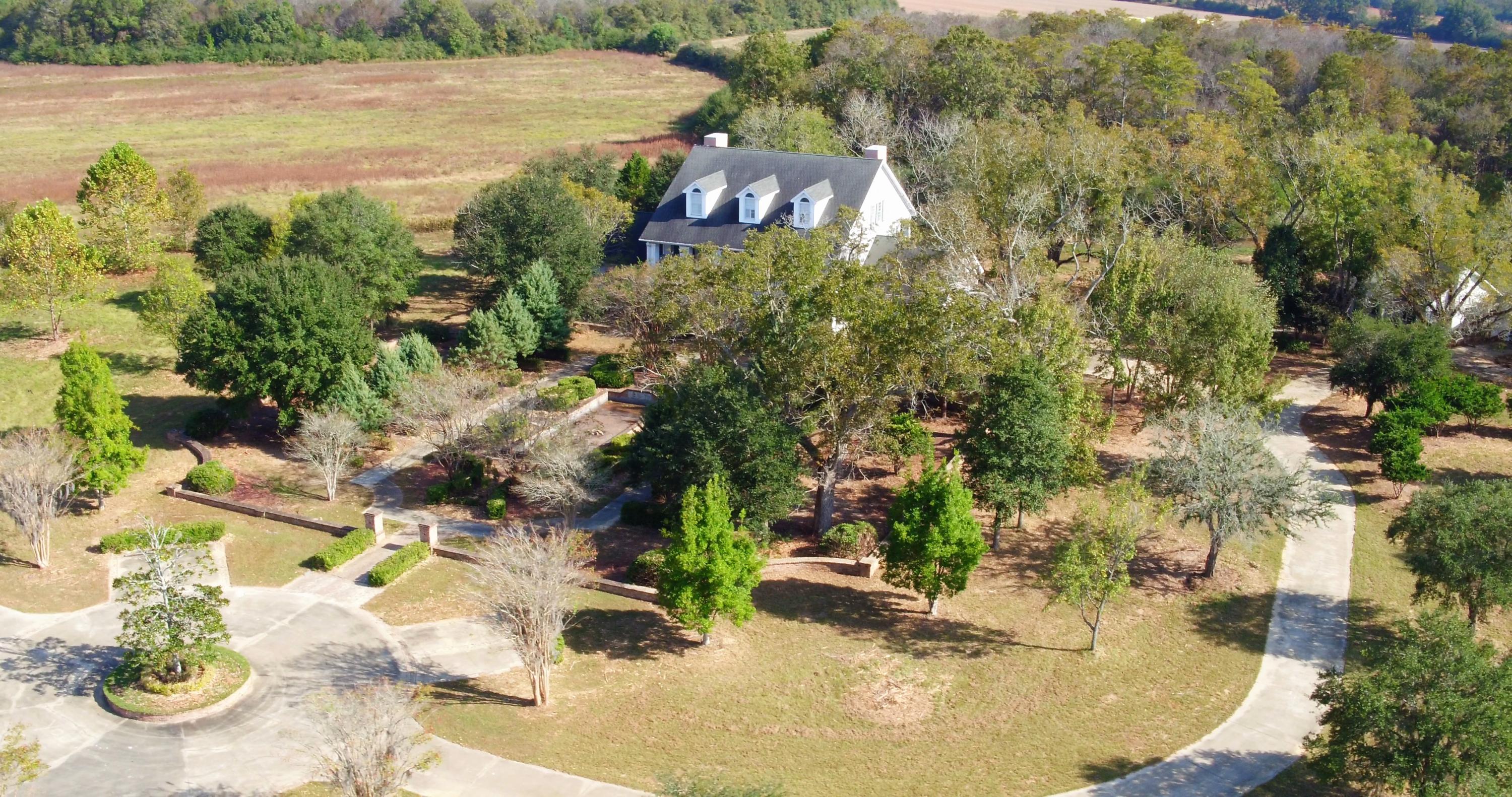 5437 Griffith Mill Road Baker, FL 32531 - Photo 60 of 100 an aerial view of a house with yard