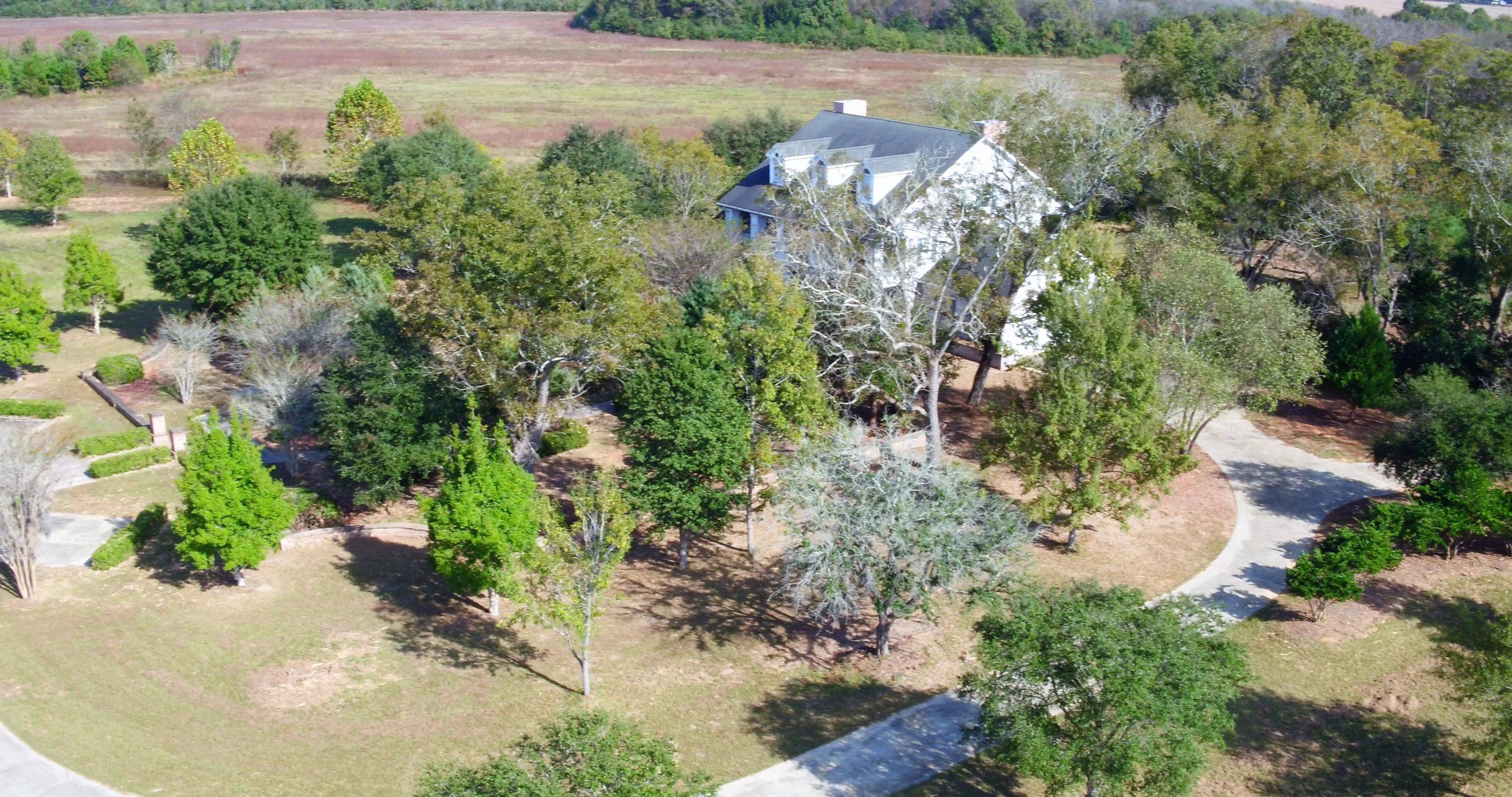 5437 Griffith Mill Road Baker, FL 32531 - Photo 65 of 100 an aerial view of a house with a yard basket ball court and outdoor seating