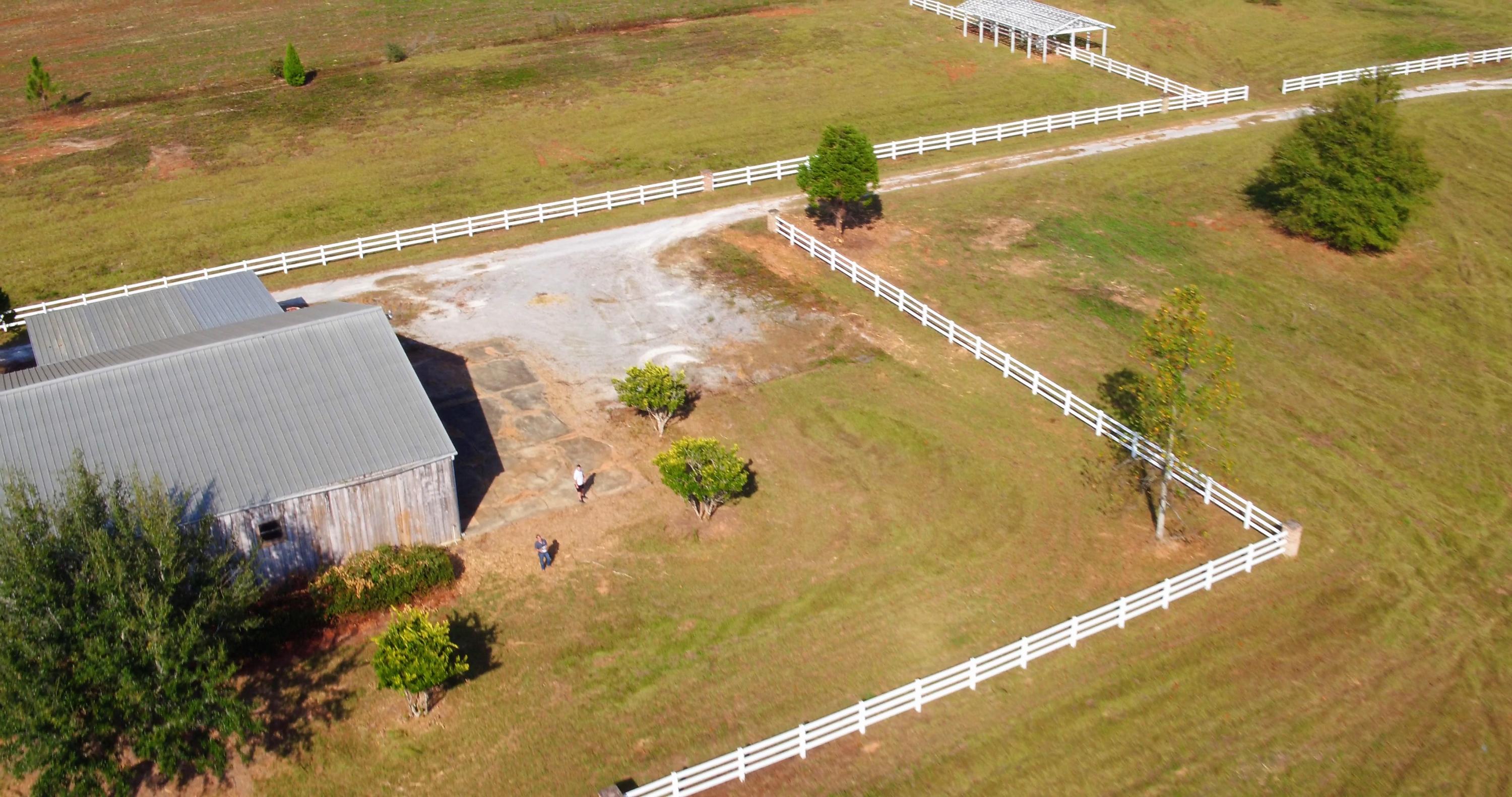 5437 Griffith Mill Road Baker, FL 32531 - Photo 87 of 100 a view of a swimming pool with an outdoor space and seating area