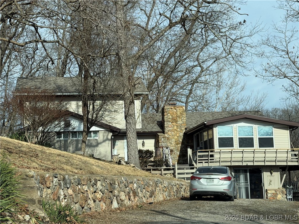 25097 Old Sante Fe Road Versailles, MO 65084 - Photo 1 of 23 1.5 story home with lovely lake view