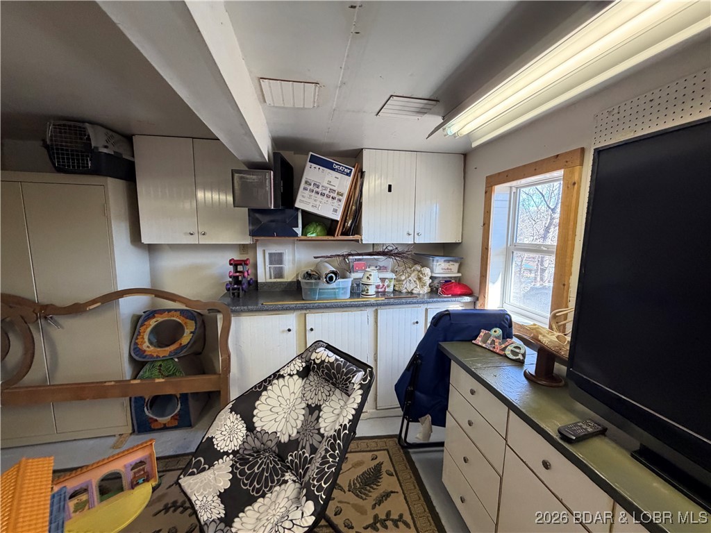 25097 Old Sante Fe Road Versailles, MO 65084 - Photo 20 of 23 Large basement for storage, workshop/craft room/wo