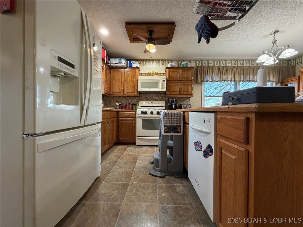 25097 Old Sante Fe Road Versailles, MO 65084 - Photo 7 of 23 another view of kitchen
