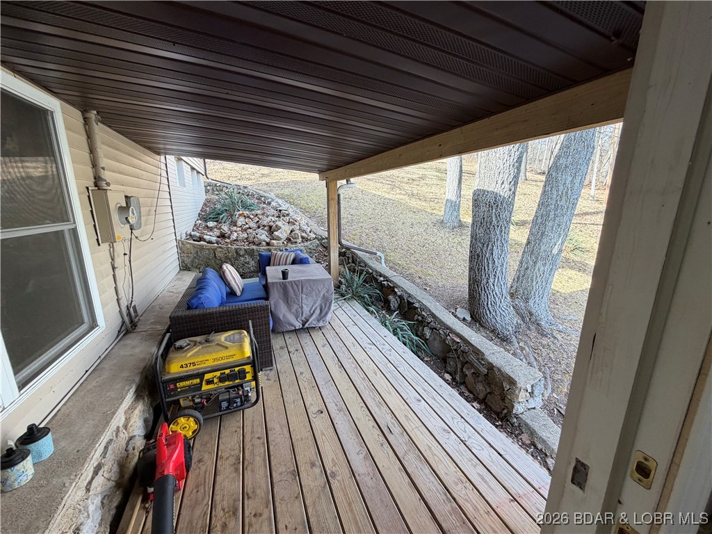 25097 Old Sante Fe Road Versailles, MO 65084 - Photo 9 of 23 Covered deck off of laundry room