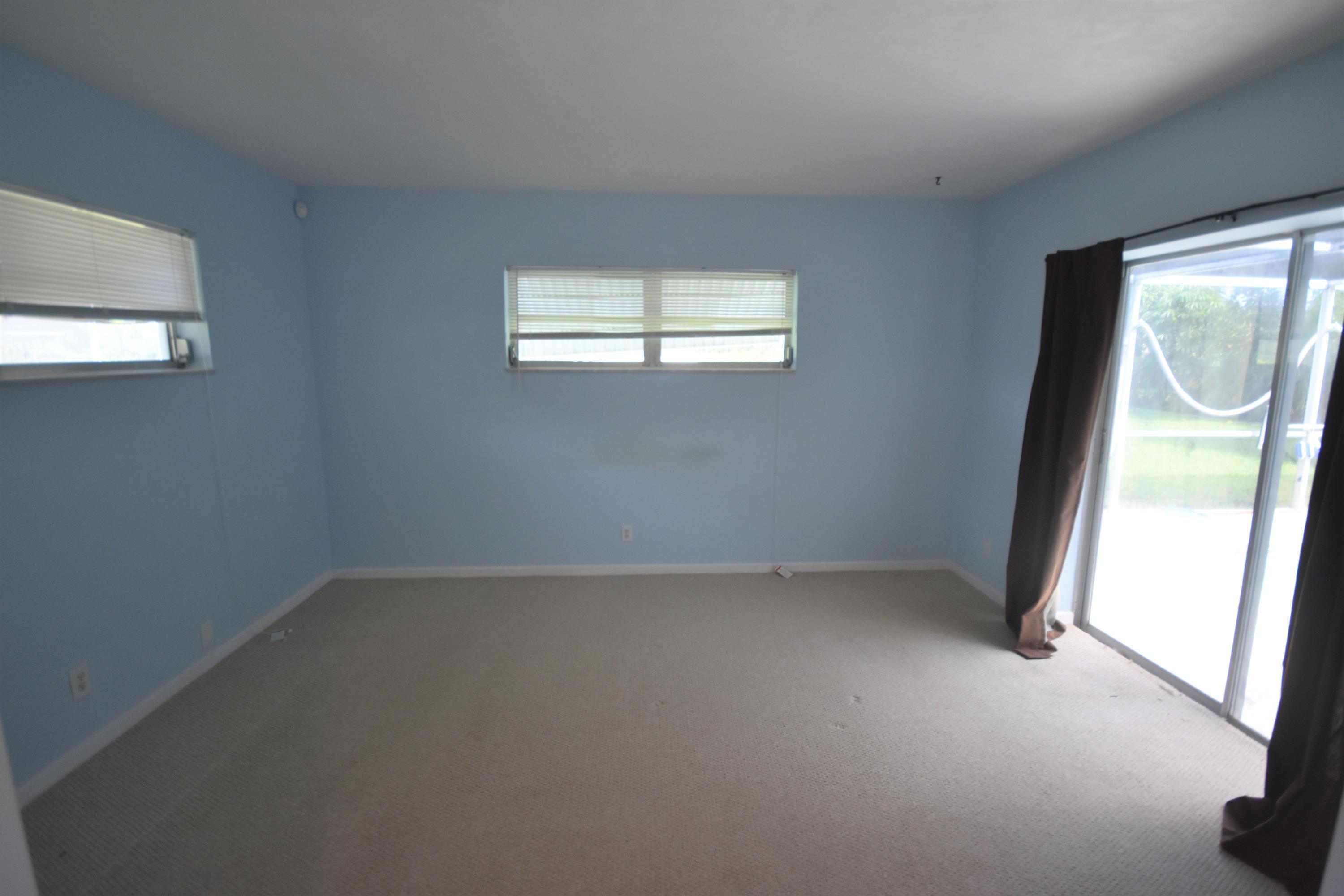 500 Northwest 12th Avenue Boca Raton, FL 33486 - Photo 11 of 23 an empty room with a window