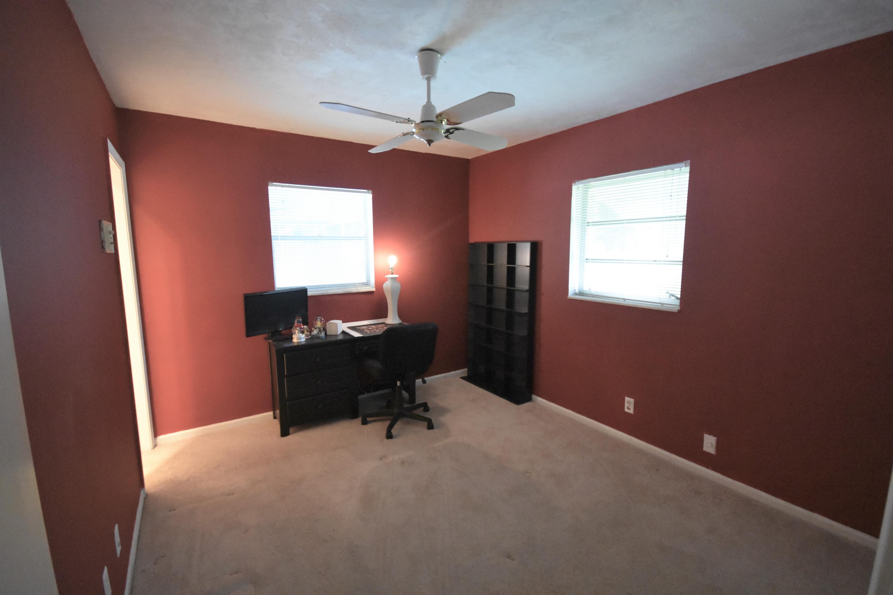 500 Northwest 12th Avenue Boca Raton, FL 33486 - Photo 14 of 23 a room that has a window and a ceiling fan
