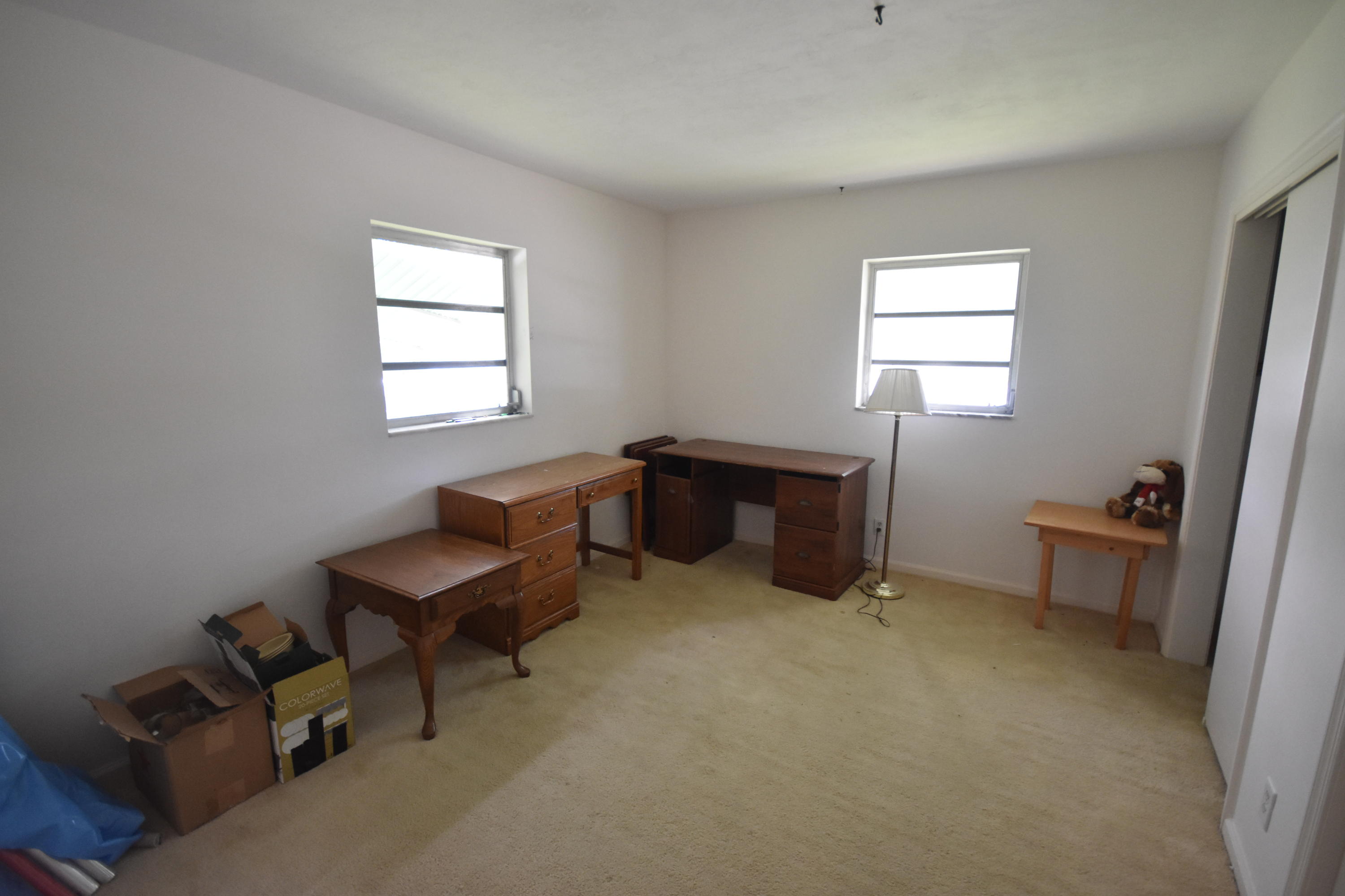 500 Northwest 12th Avenue Boca Raton, FL 33486 - Photo 15 of 23 a room with furniture and a window