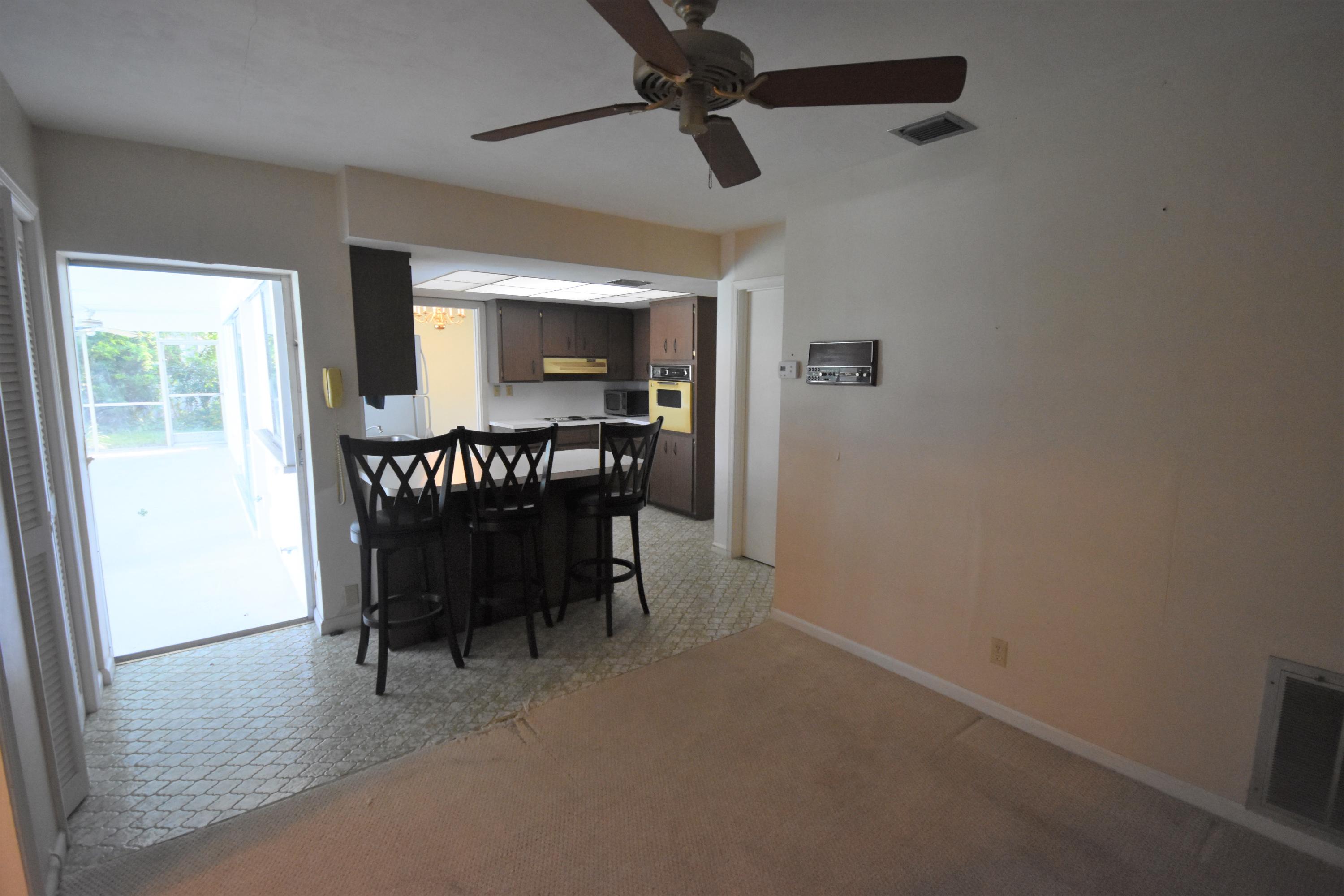 500 Northwest 12th Avenue Boca Raton, FL 33486 - Photo 9 of 23 a view of a dining room with furniture