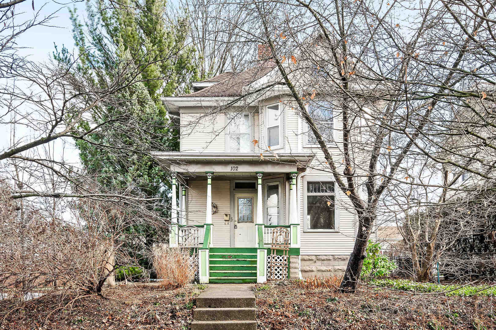 102 Vale Street Bloomington, IL 61701 - Photo 1 of 35 a front view of a house with garden