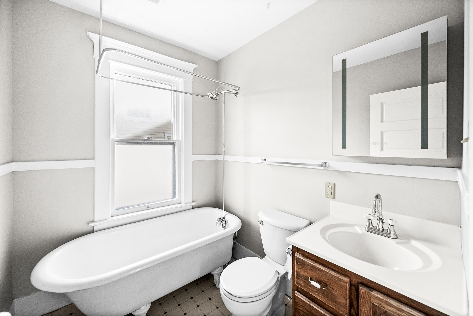 102 Vale Street Bloomington, IL 61701 - Photo 25 of 35 a bathroom with a sink toilet a mirror and shower