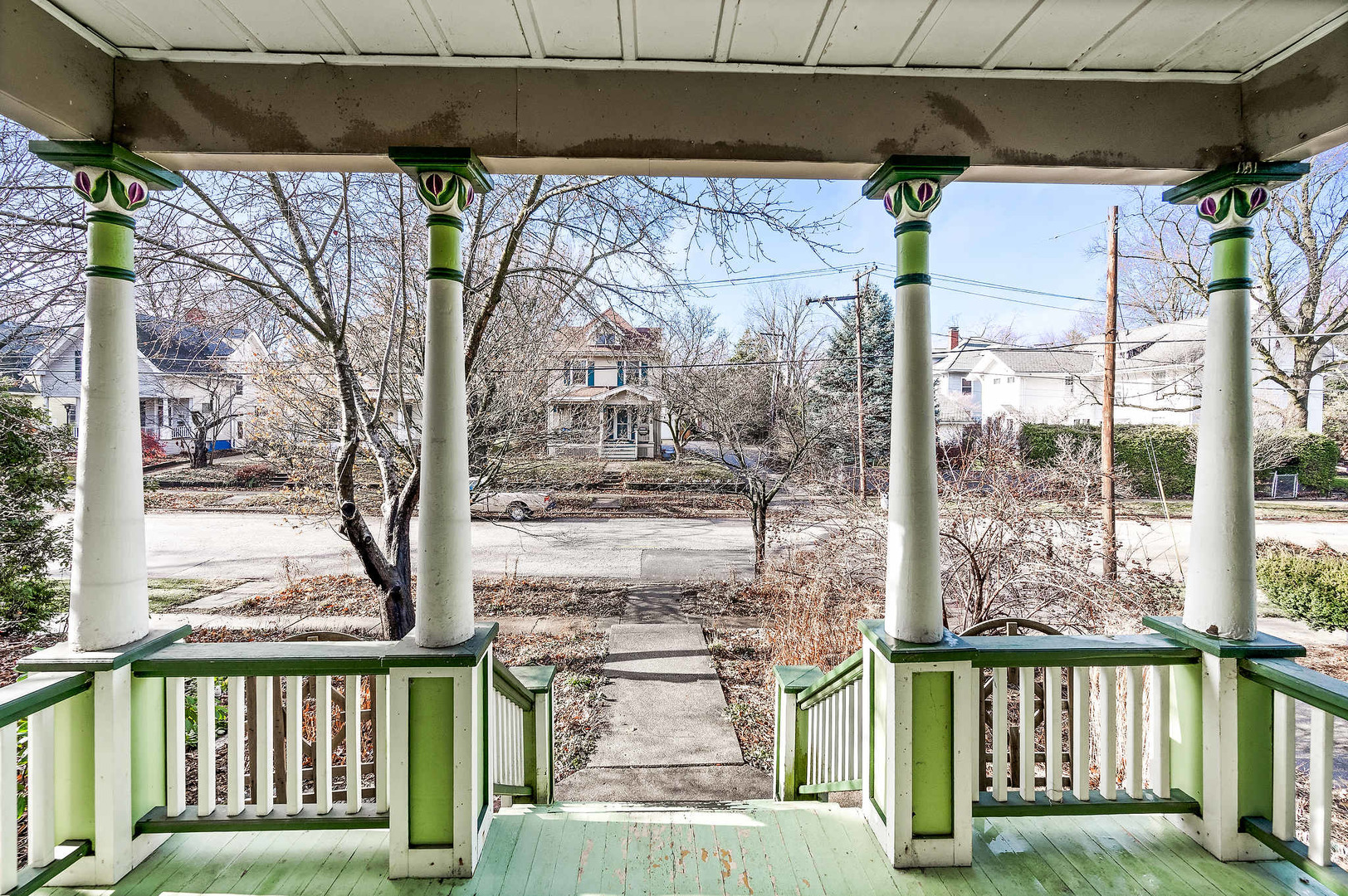 102 Vale Street Bloomington, IL 61701 - Photo 3 of 35 a view of a porch with a floor to ceiling window and tree