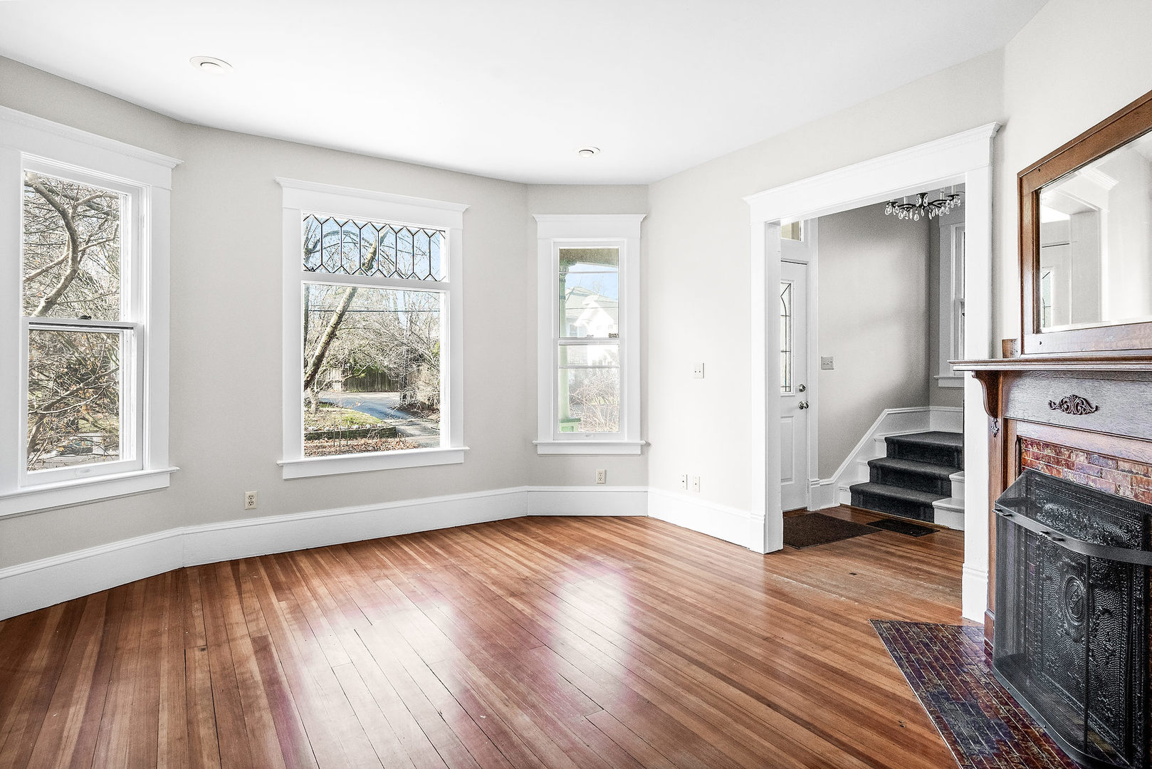 102 Vale Street Bloomington, IL 61701 - Photo 8 of 35 wooden floor in an empty room with a window