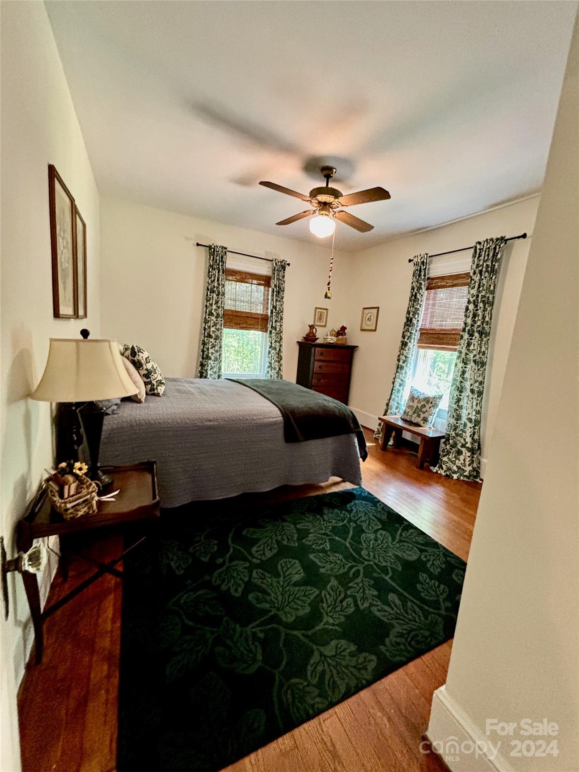 352 Chimney Rock Road Rutherfordton, NC 28139 - Photo 17 of 48 a bedroom with a bed window and dresser