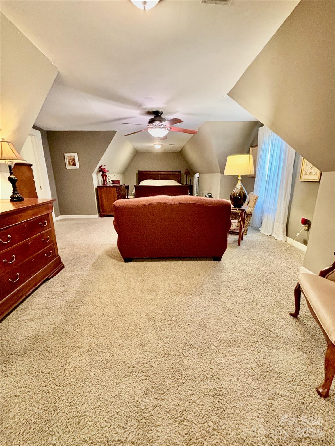 352 Chimney Rock Road Rutherfordton, NC 28139 - Photo 23 of 48 a bedroom with a bed and window