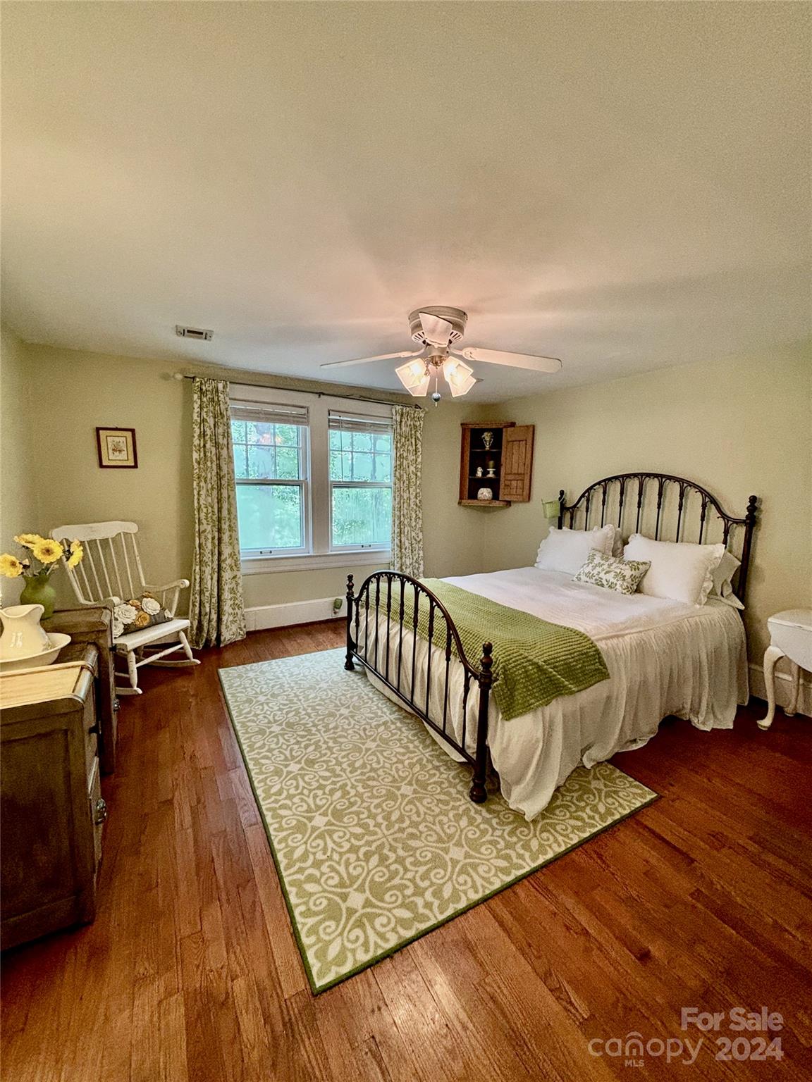 352 Chimney Rock Road Rutherfordton, NC 28139 - Photo 27 of 48 a bedroom with a bed a couch and dresser