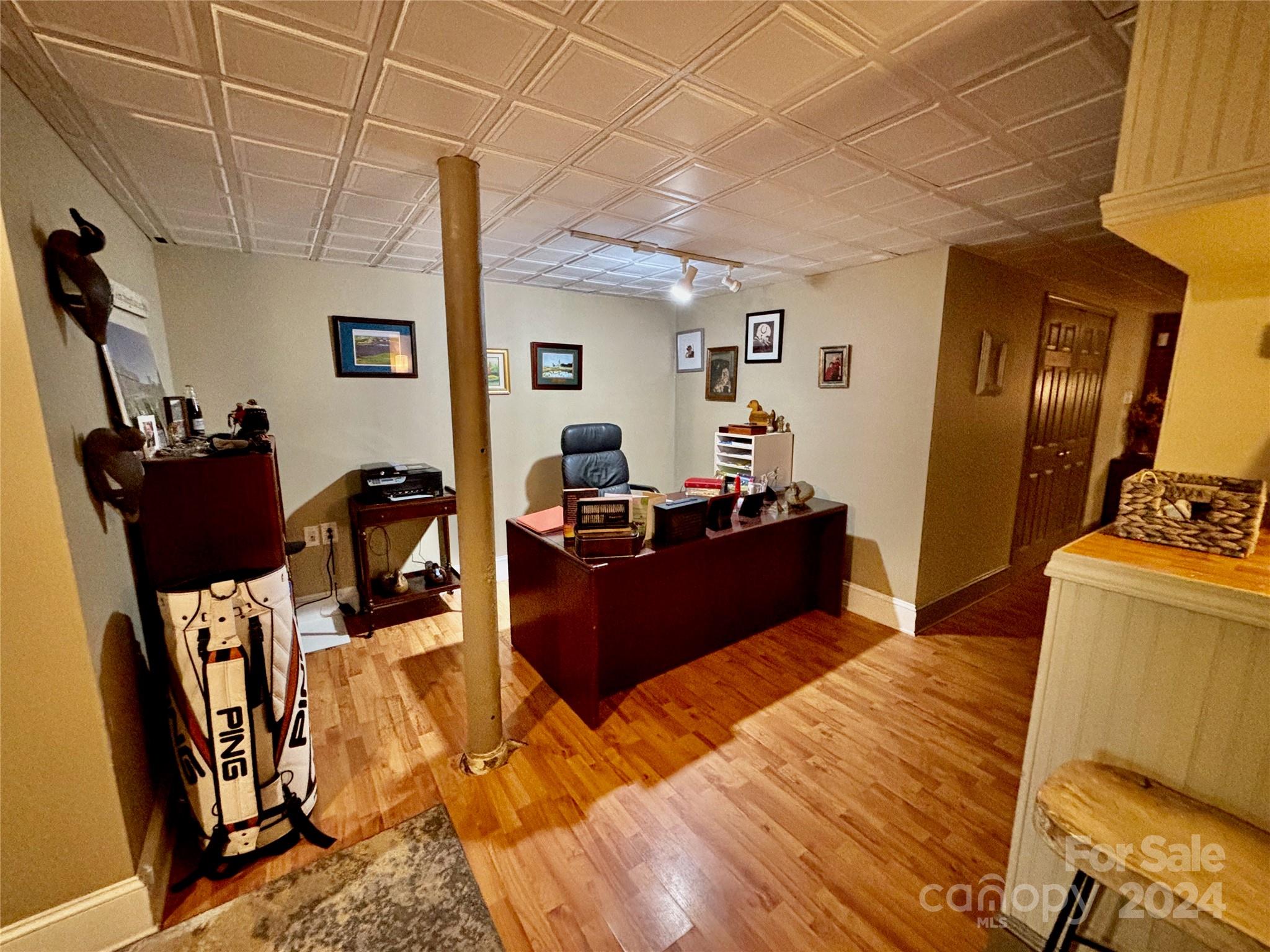 352 Chimney Rock Road Rutherfordton, NC 28139 - Photo 33 of 48 a living room with furniture and a flat screen tv