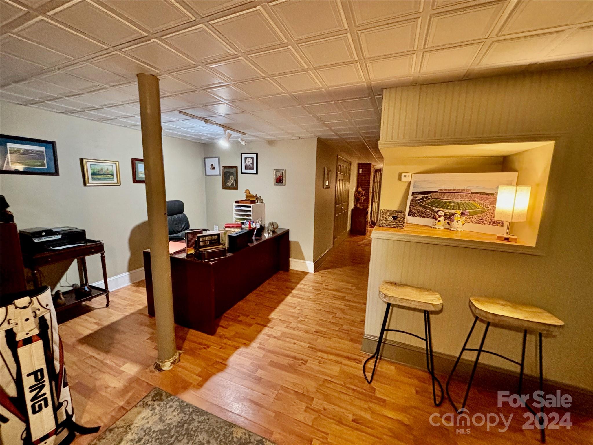 352 Chimney Rock Road Rutherfordton, NC 28139 - Photo 35 of 48 a living room with furniture and a wooden floor