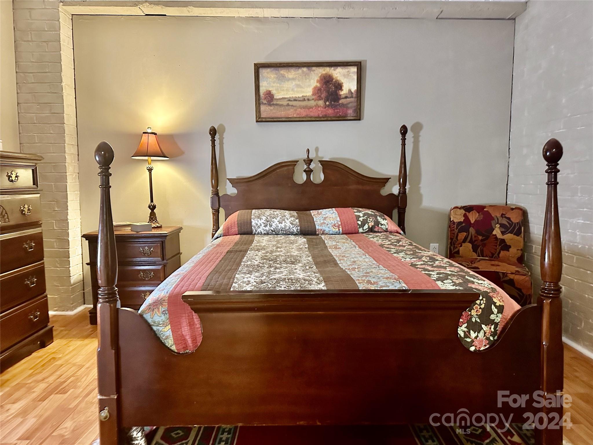 352 Chimney Rock Road Rutherfordton, NC 28139 - Photo 36 of 48 a bedroom with a bed and dresser