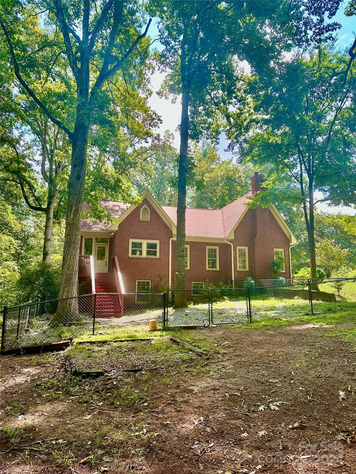 352 Chimney Rock Road Rutherfordton, NC 28139 - Photo 42 of 48 a house view with a outdoor space