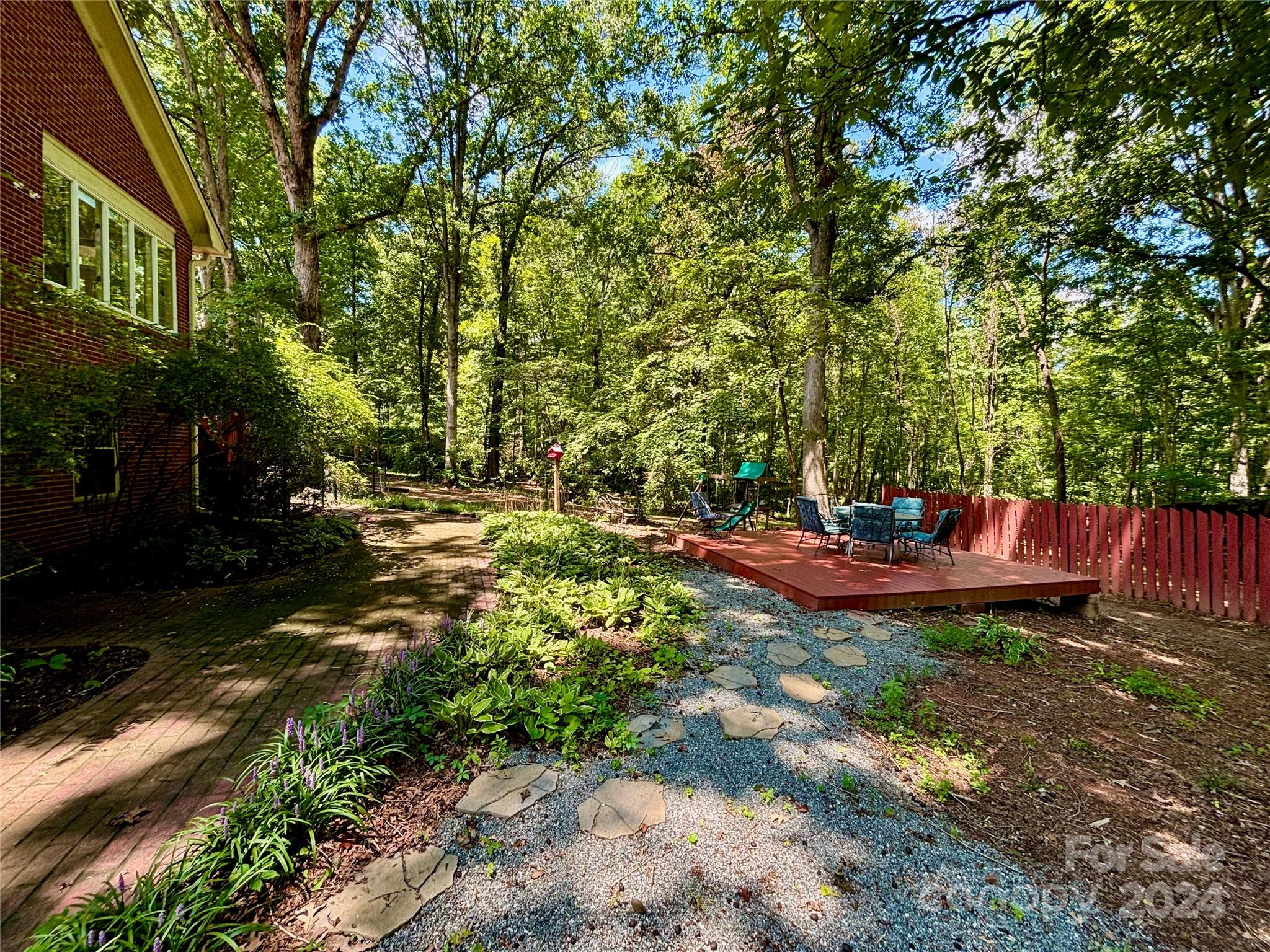 352 Chimney Rock Road Rutherfordton, NC 28139 - Photo 44 of 48 a view of a patio with chair and table of the house