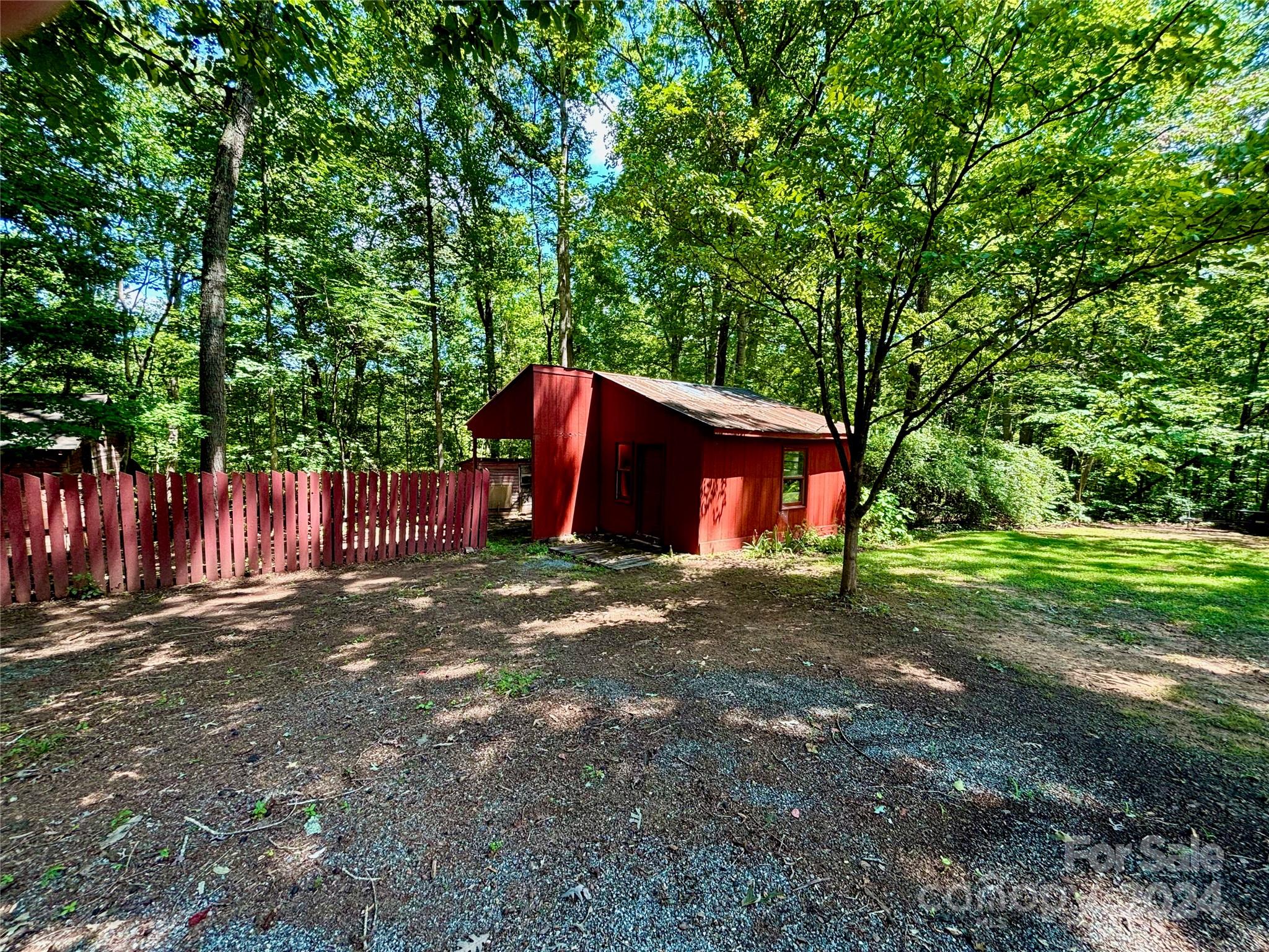 352 Chimney Rock Road Rutherfordton, NC 28139 - Photo 46 of 48 a view of a backyard with a trees