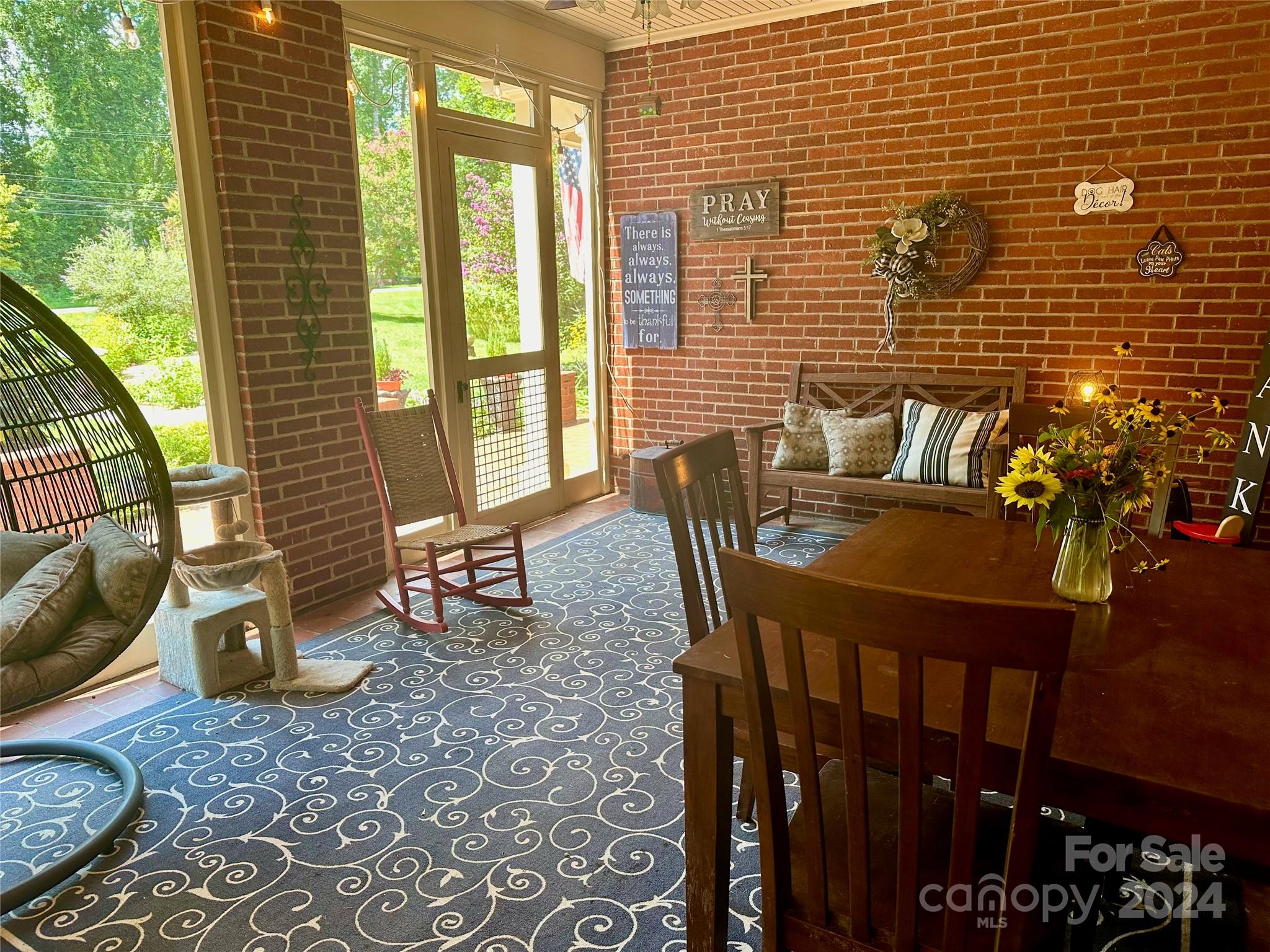 352 Chimney Rock Road Rutherfordton, NC 28139 - Photo 5 of 48 a view of a dining room with furniture window and outside view