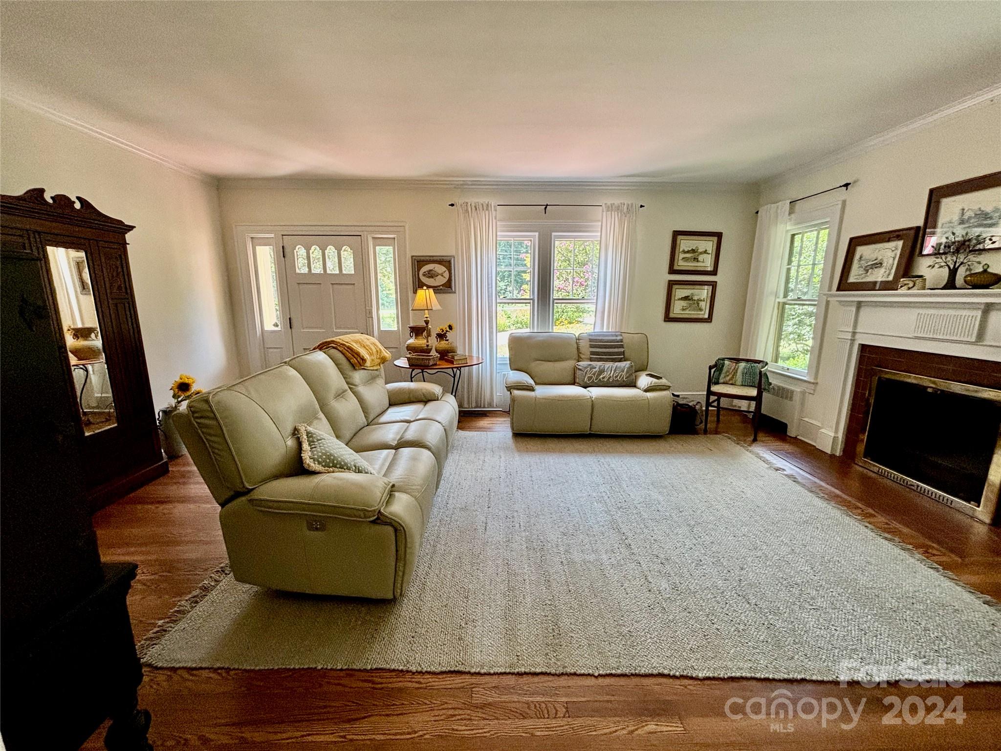 352 Chimney Rock Road Rutherfordton, NC 28139 - Photo 6 of 48 a living room with furniture window and a fireplace