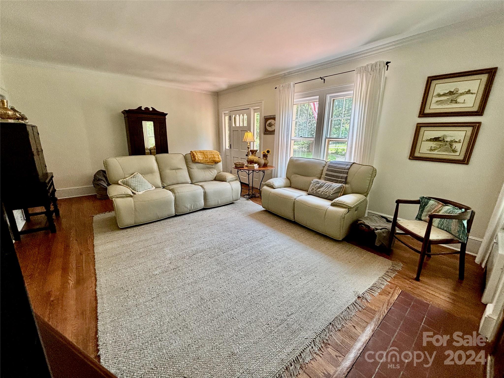 352 Chimney Rock Road Rutherfordton, NC 28139 - Photo 7 of 48 a living room with furniture and a couch