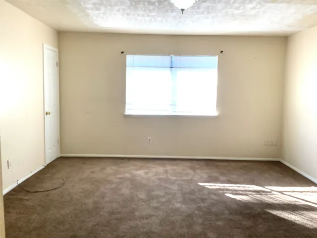a bathroom with a sink vanity and mirror