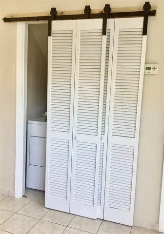 a view of a bathroom with closet