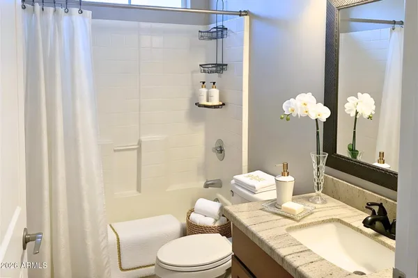 a view of a swimming pool with an outdoor space and seating area