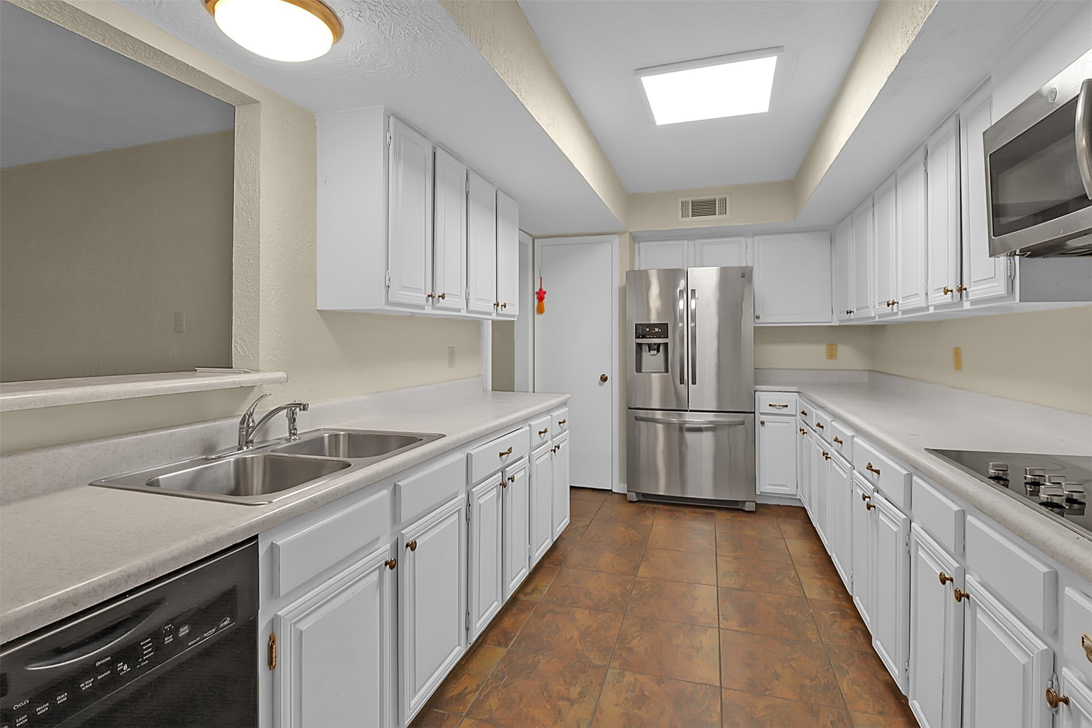 1304 Ward Road, Unit 5 Baytown, TX 77520 - Photo 4 of 19 a kitchen with granite countertop a sink dishwasher stove and refrigerator with wooden floor