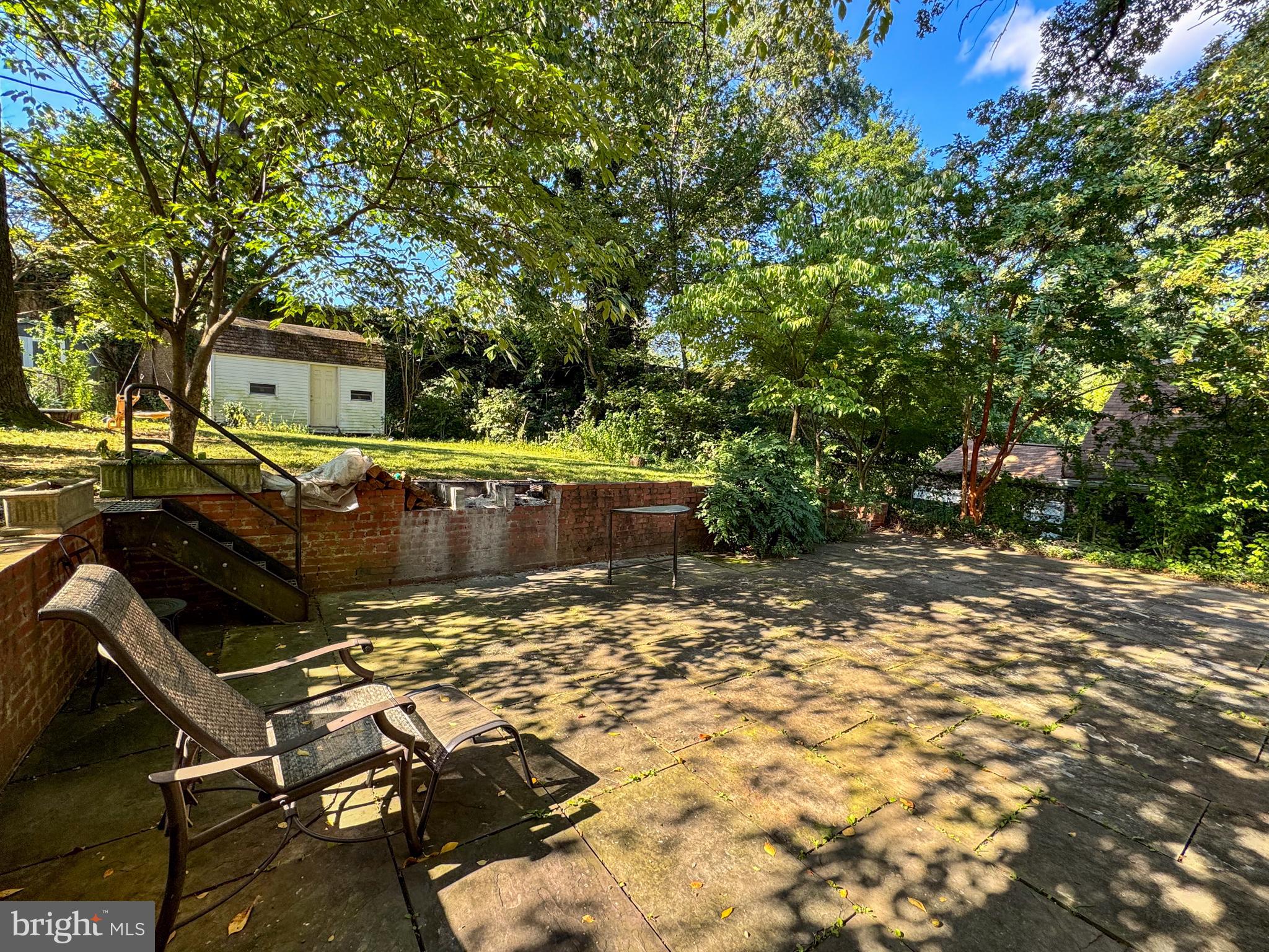 706 Forest Glen Road Silver Spring, MD 20901 - Photo 37 of 40 a view of a backyard with sitting area