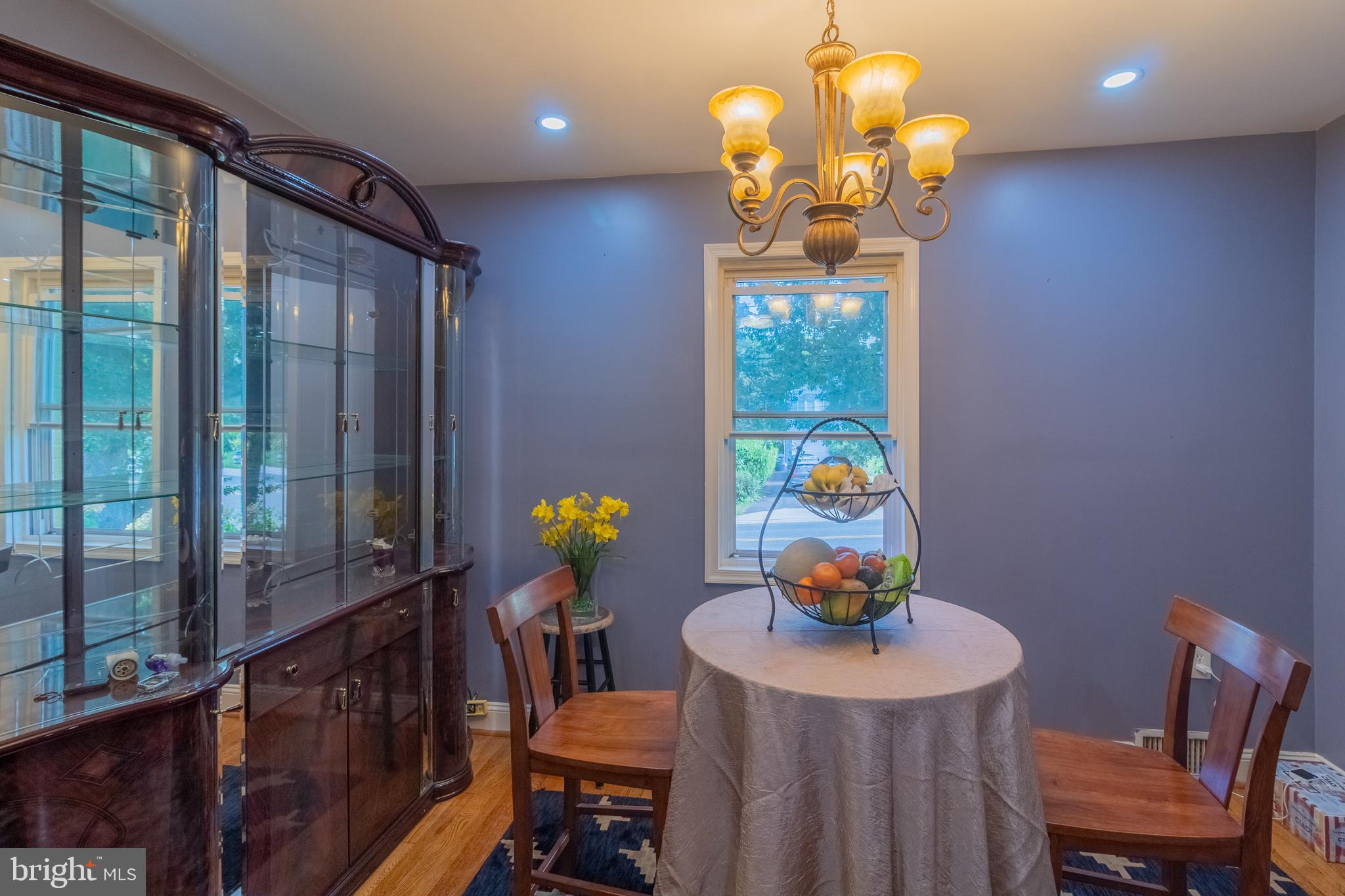 706 Forest Glen Road Silver Spring, MD 20901 - Photo 6 of 40 a dining room with furniture and wooden floor