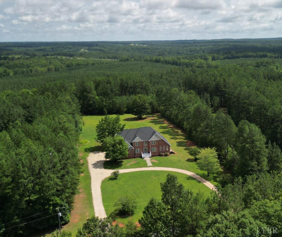 1505 Chestnut Grv Road Appomattox, VA 24522 - Photo 1 of 99 an aerial view of a house with a garden