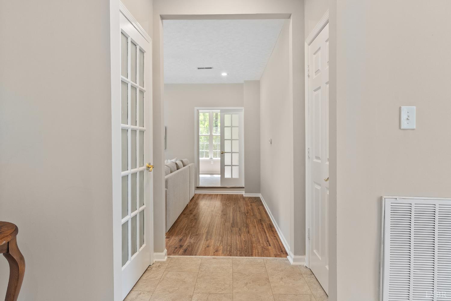 1505 Chestnut Grv Road Appomattox, VA 24522 - Photo 16 of 99 a view of a hallway with wooden floor and staircase