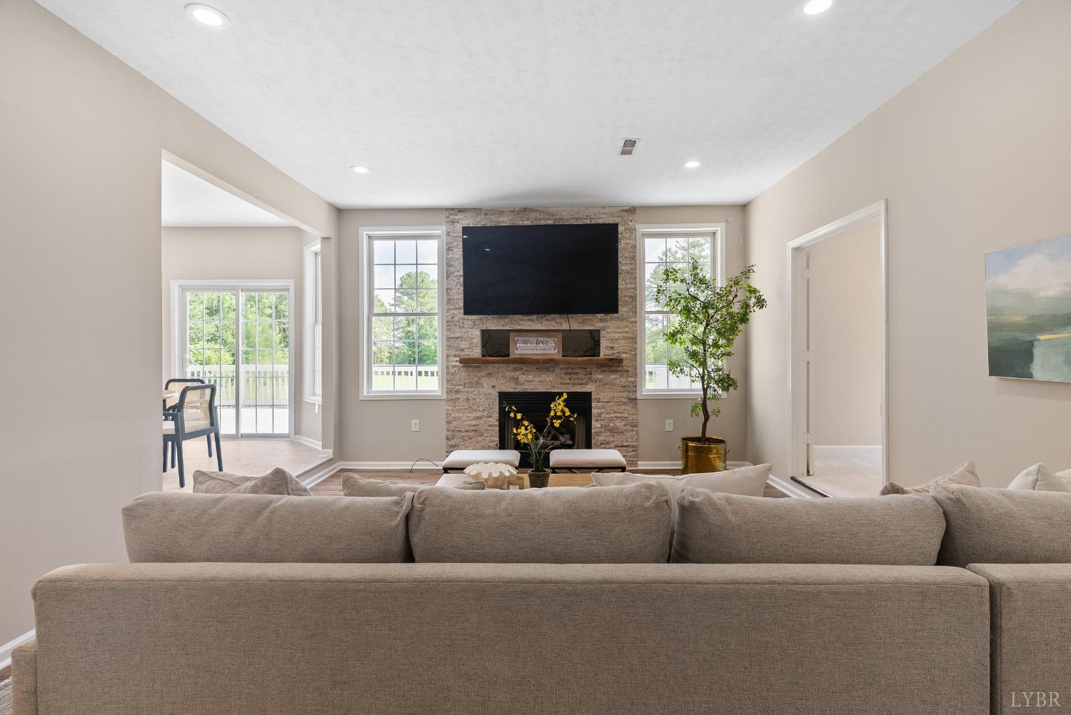 1505 Chestnut Grv Road Appomattox, VA 24522 - Photo 18 of 99 a living room with furniture and a flat screen tv