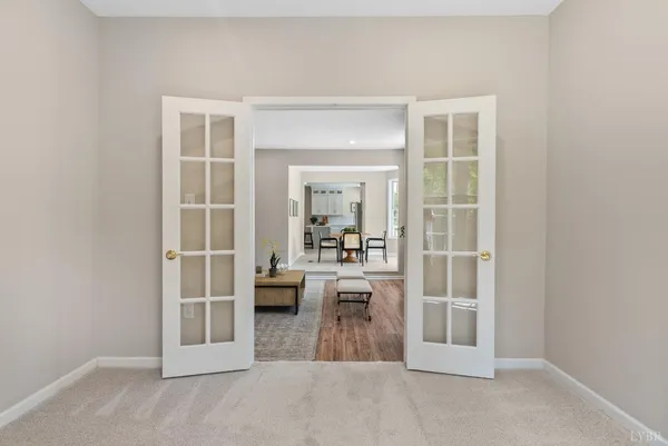 a kitchen with appliances a sink a counter top space and a center island