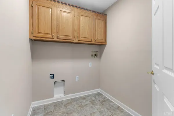 an empty room with a empty space and a window