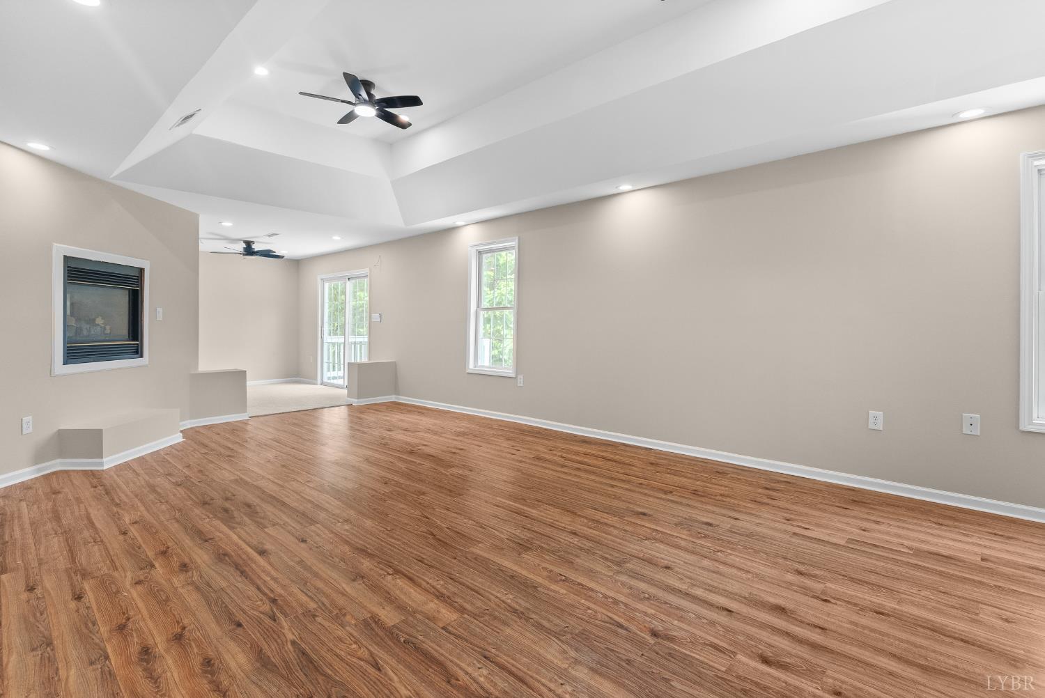 1505 Chestnut Grv Road Appomattox, VA 24522 - Photo 43 of 99 an empty room with wooden floor and windows