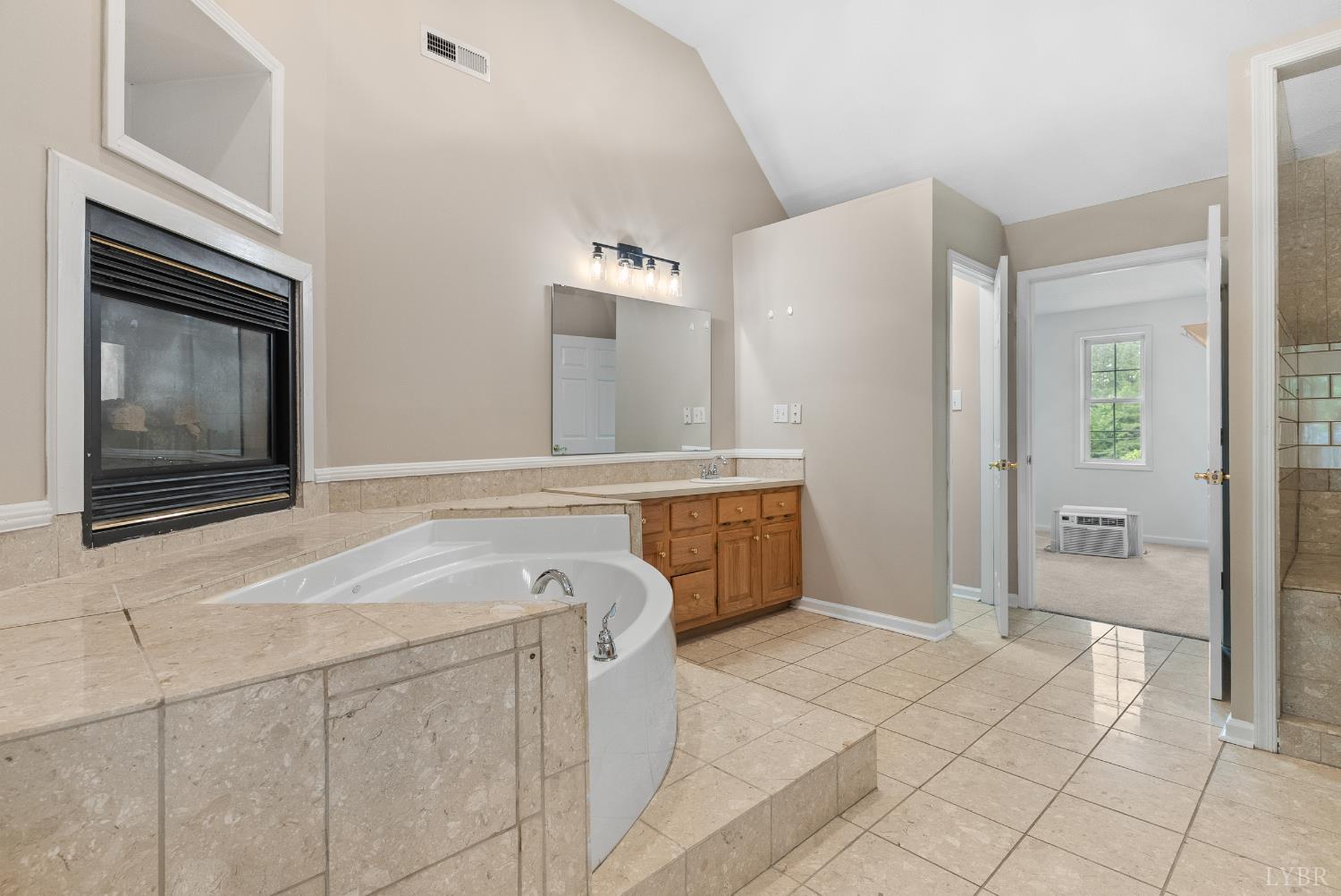 1505 Chestnut Grv Road Appomattox, VA 24522 - Photo 48 of 99 a spacious bathroom with a sink a mirror and a bathtub