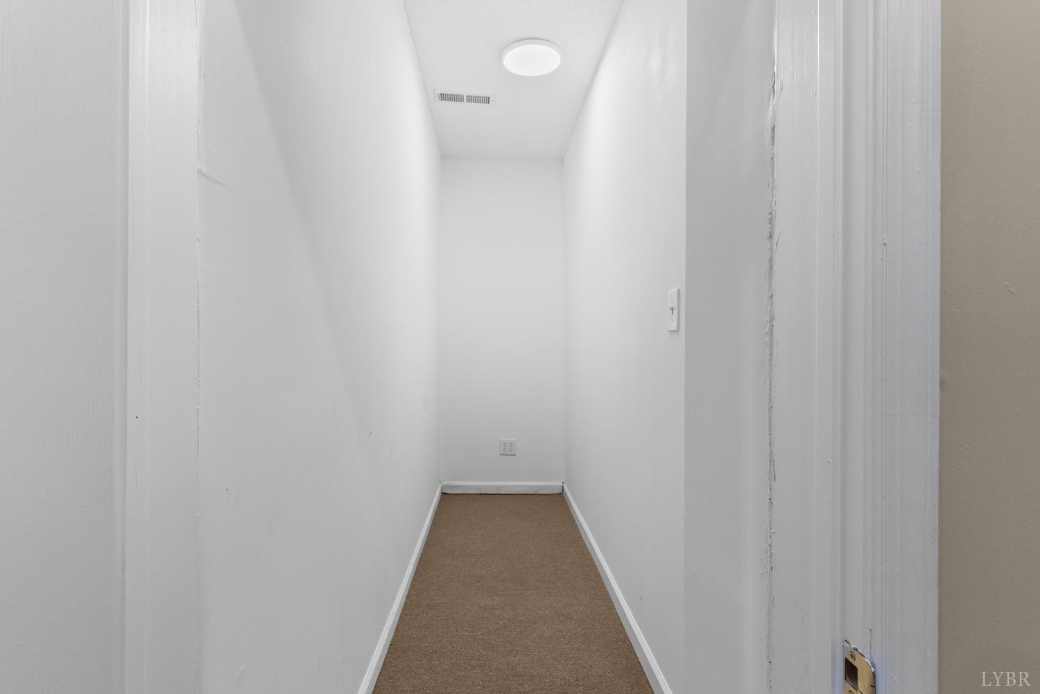 1505 Chestnut Grv Road Appomattox, VA 24522 - Photo 69 of 99 a view of a hallway with wooden floor