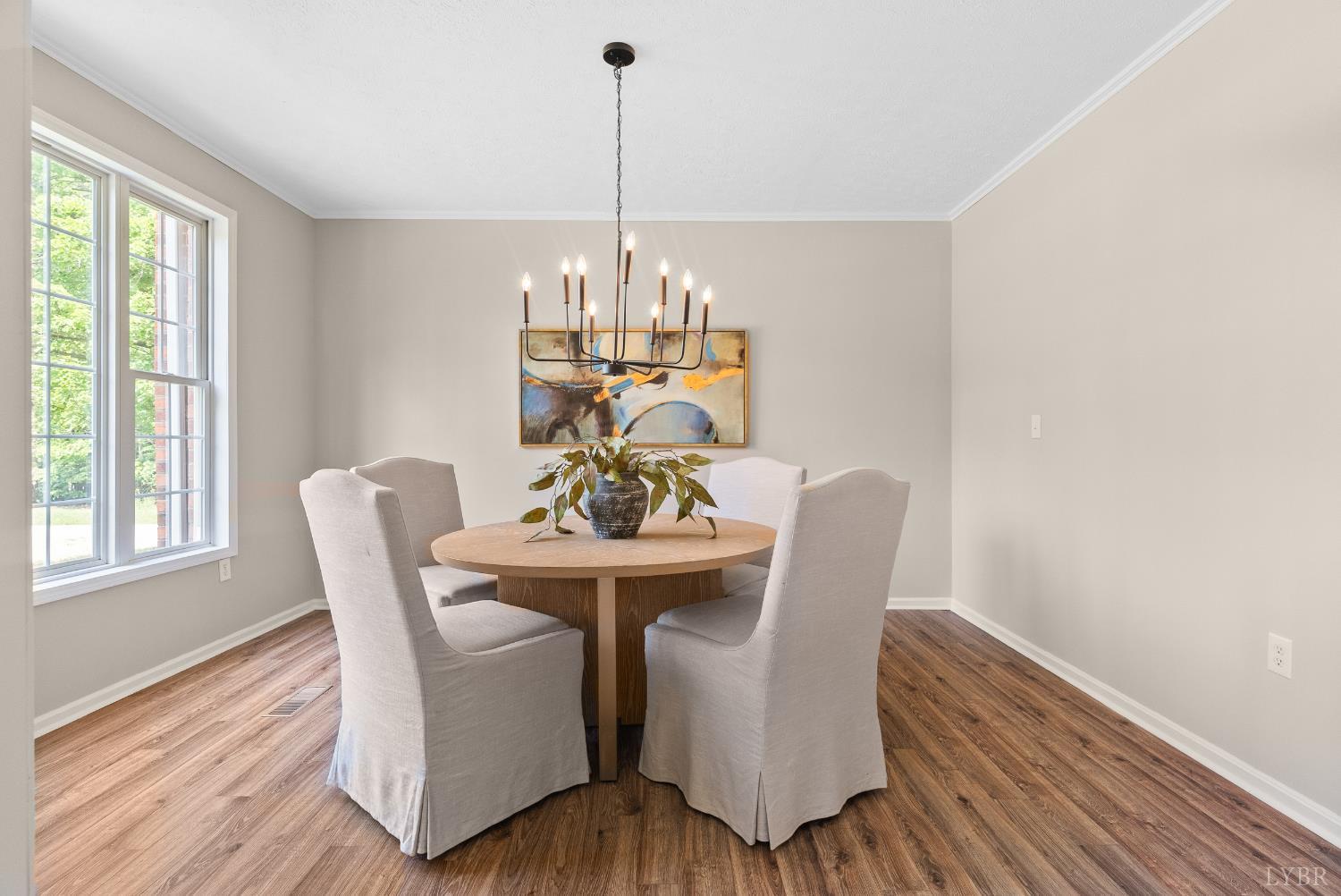 1505 Chestnut Grv Road Appomattox, VA 24522 - Photo 7 of 99 a dining room with furniture a chandelier and wooden floor