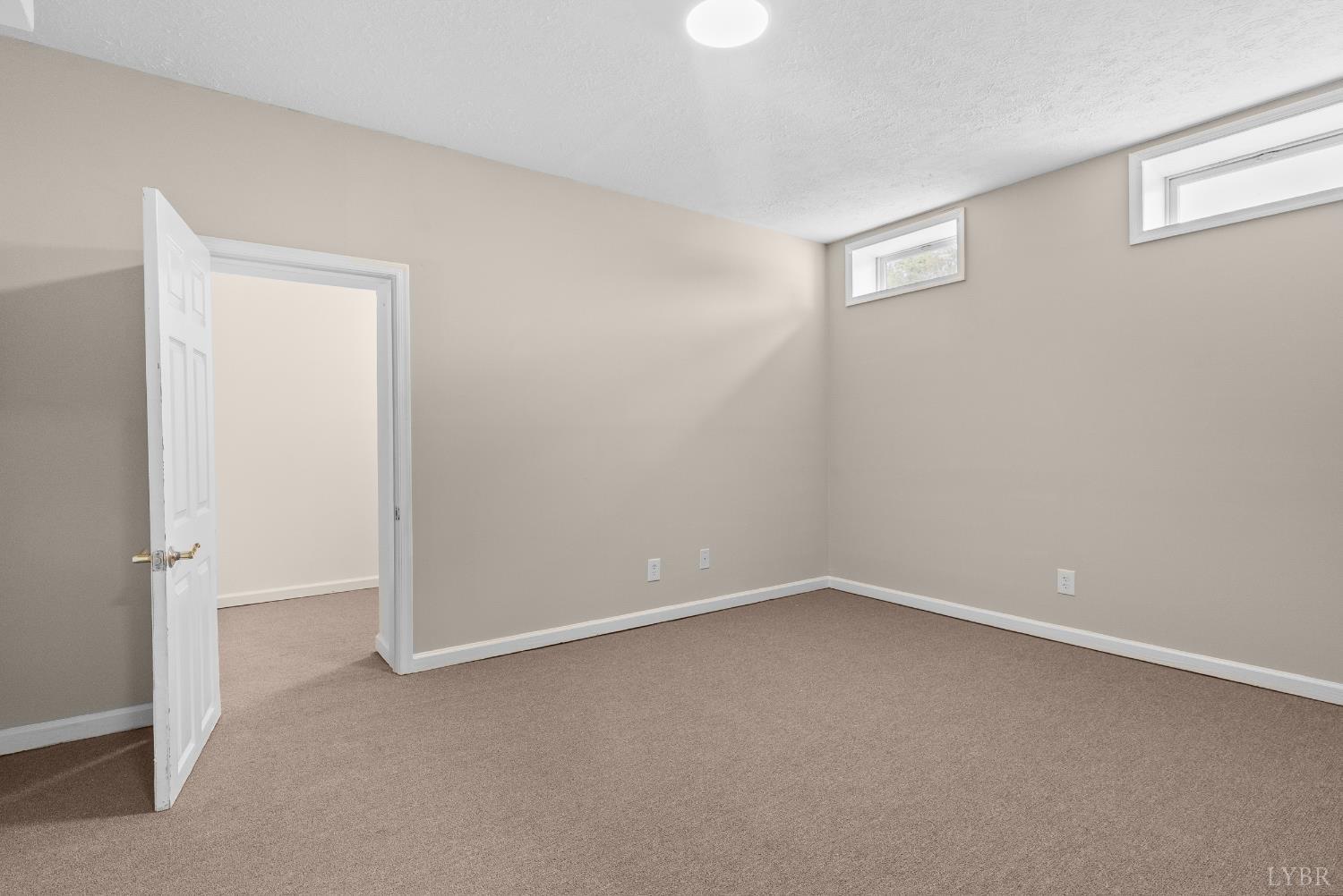 1505 Chestnut Grv Road Appomattox, VA 24522 - Photo 71 of 99 an empty room with a empty space and a window