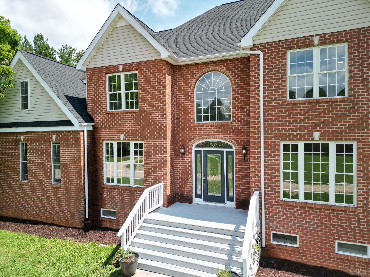 1505 Chestnut Grv Road Appomattox, VA 24522 - Photo 78 of 99 a front view of a house with a yard