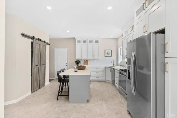 a bathroom with a toilet a sink and a bathtub