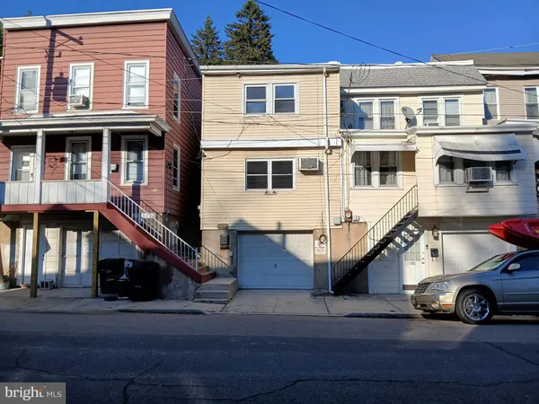 a car parked in front of a building