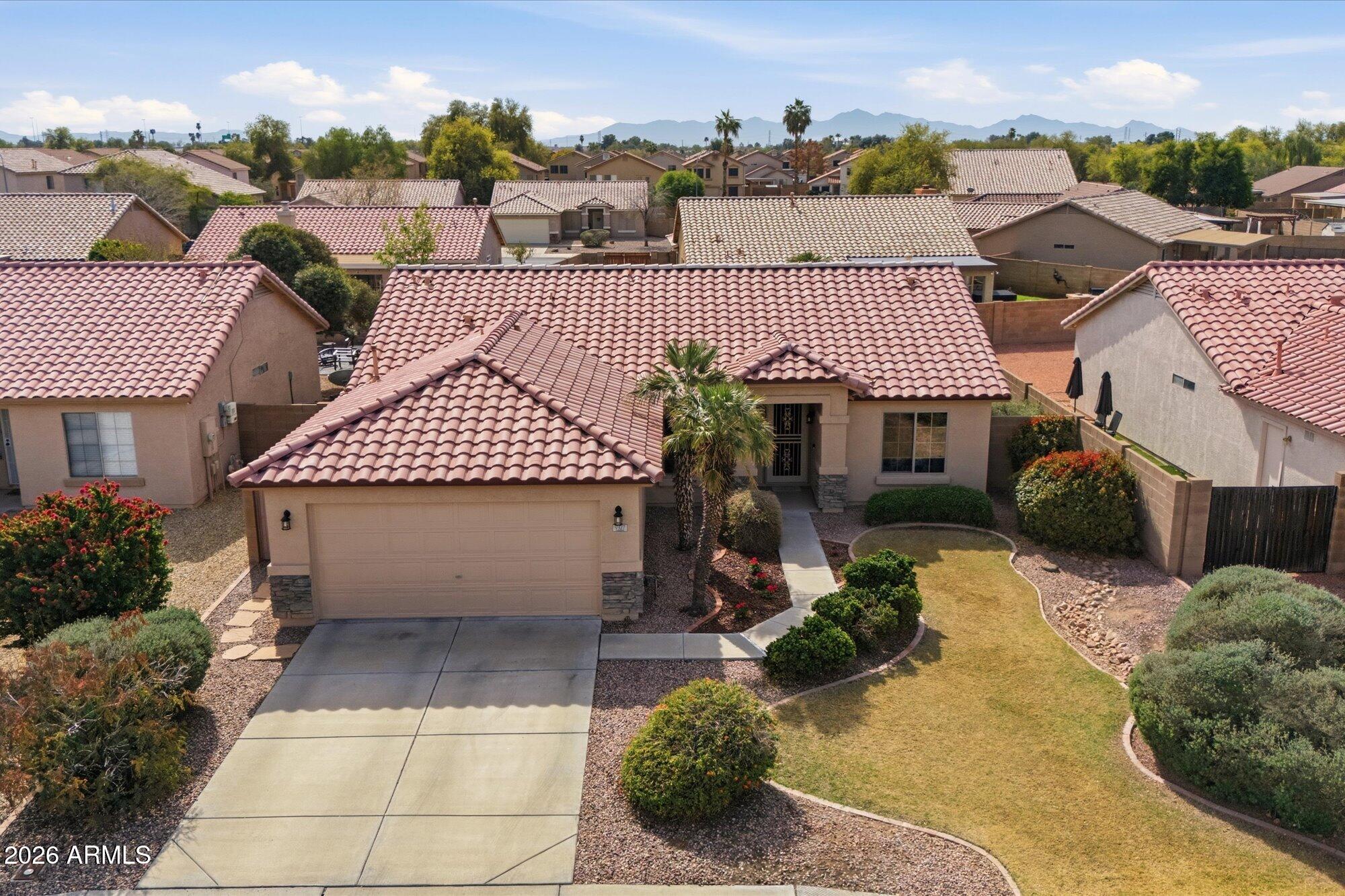 9327 West Mountain View Road Peoria, AZ 85345 - Photo 3 of 30 a view of a house with a patio