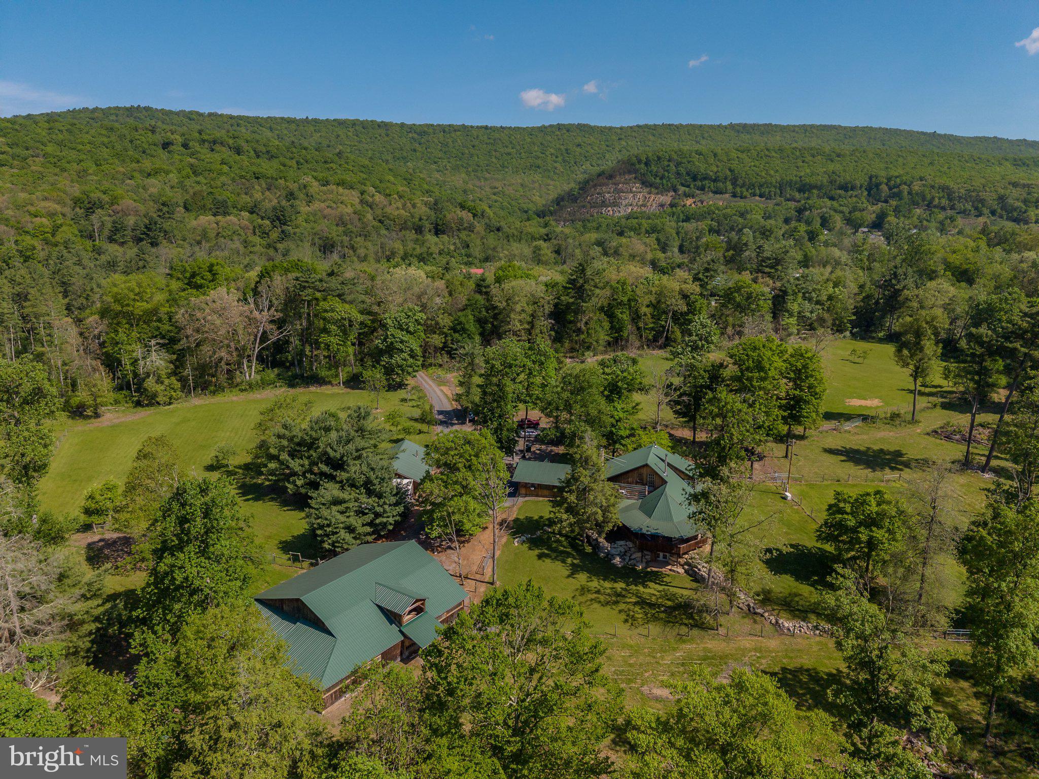 1520 Lingle Valley Road Milroy, PA 17063 - Photo 2 of 144 Serene retreat amid lush greenery.