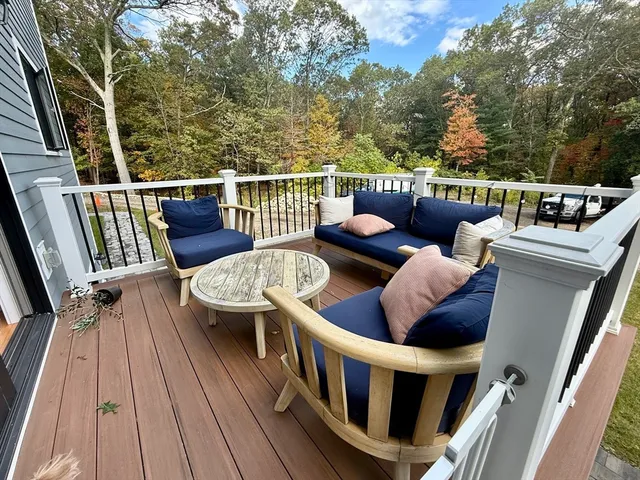 a view of balcony with furniture