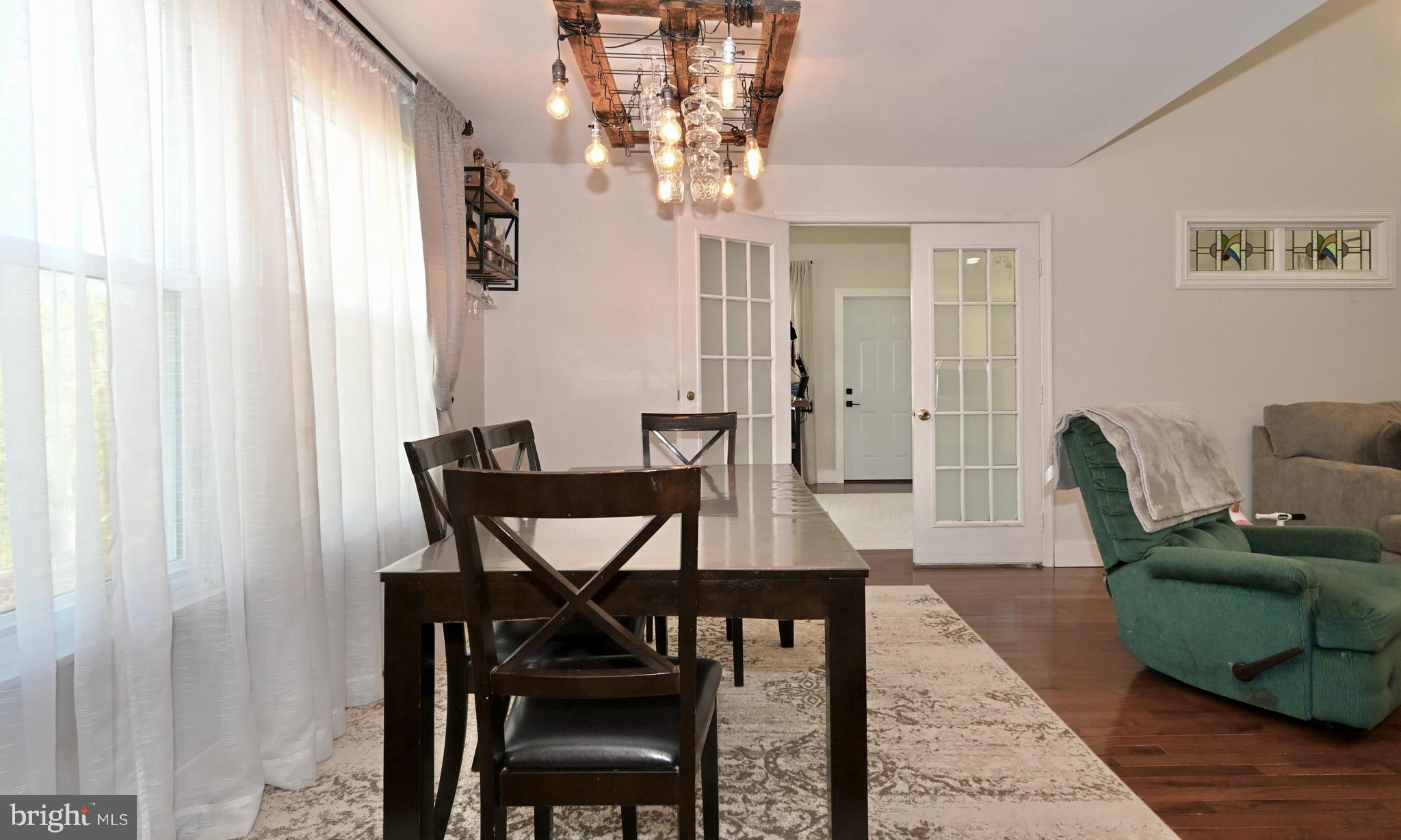 651 Walton Road Huntingtown, MD 20639 - Photo 20 of 58 dining area connects with living room
